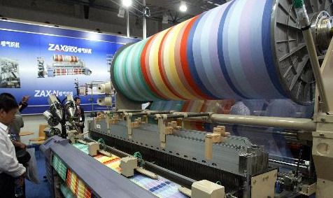 参加法国巴黎国际纺织机械展览会 签订泰国泰美伦棉纺厂出口设备三期